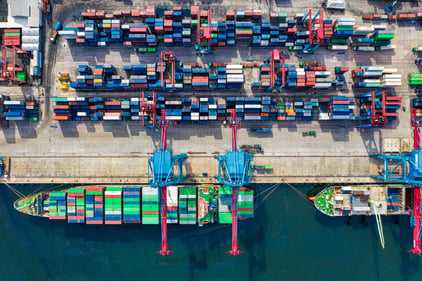 Image shows container ships at a port . Copyright is owned by Tom Fisk and is available from Pexels